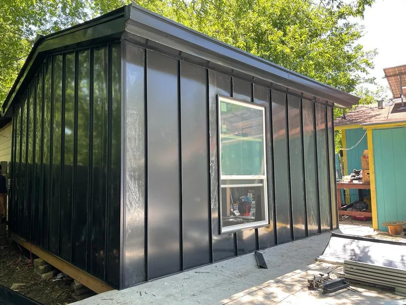 Black standing seam metal wall panels for Metal Roof Installation in Sangaree